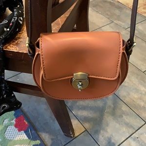 Hand crafted leather cross body purse